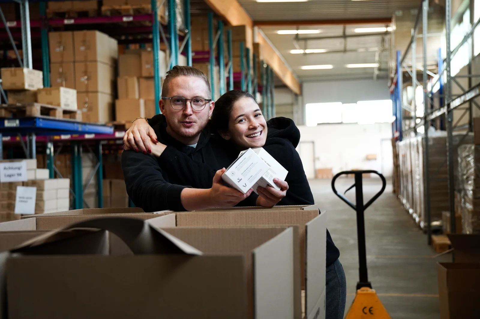 Frederik and Nicole packing orders in the Graycano warehouse